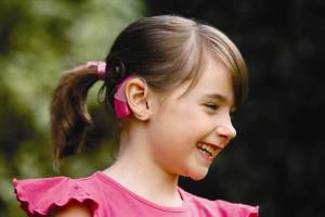 smiling_girl_cochlear_implant